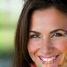 Sophia Greene, a smiling client who won her personal injury settlement